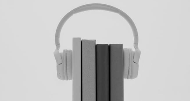 an xx59 headphones with books